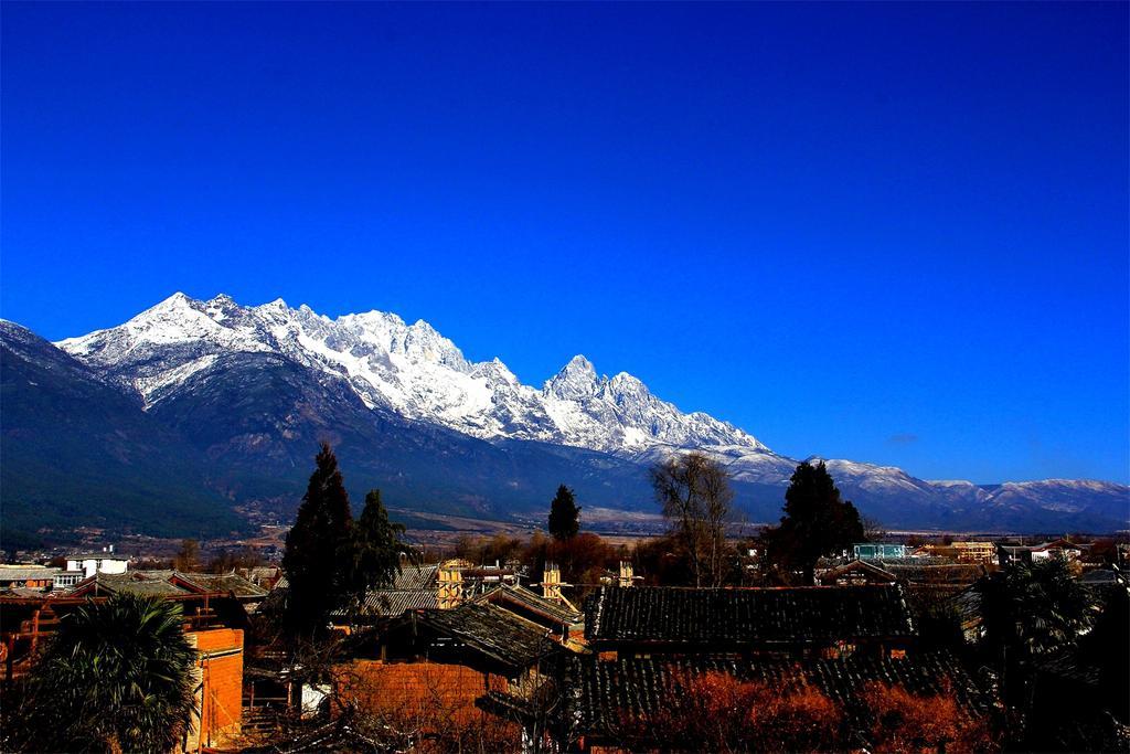 Lijiang Baisha Free Time Designed Hotel Exterior photo