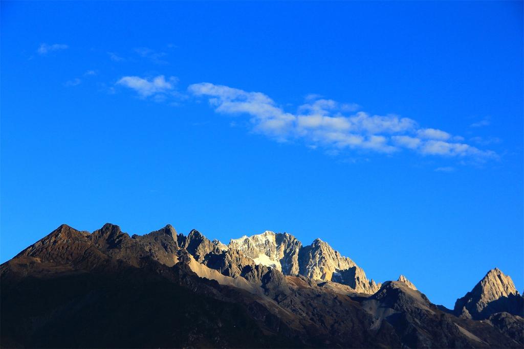 Lijiang Baisha Free Time Designed Hotel Exterior photo