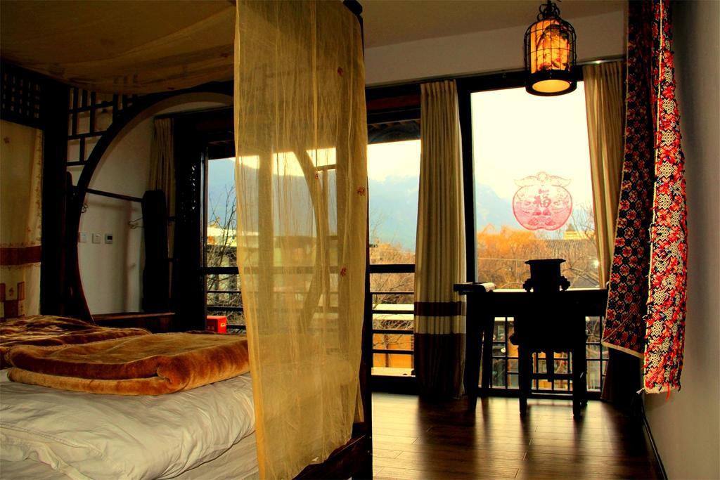 Lijiang Baisha Free Time Designed Hotel Exterior photo