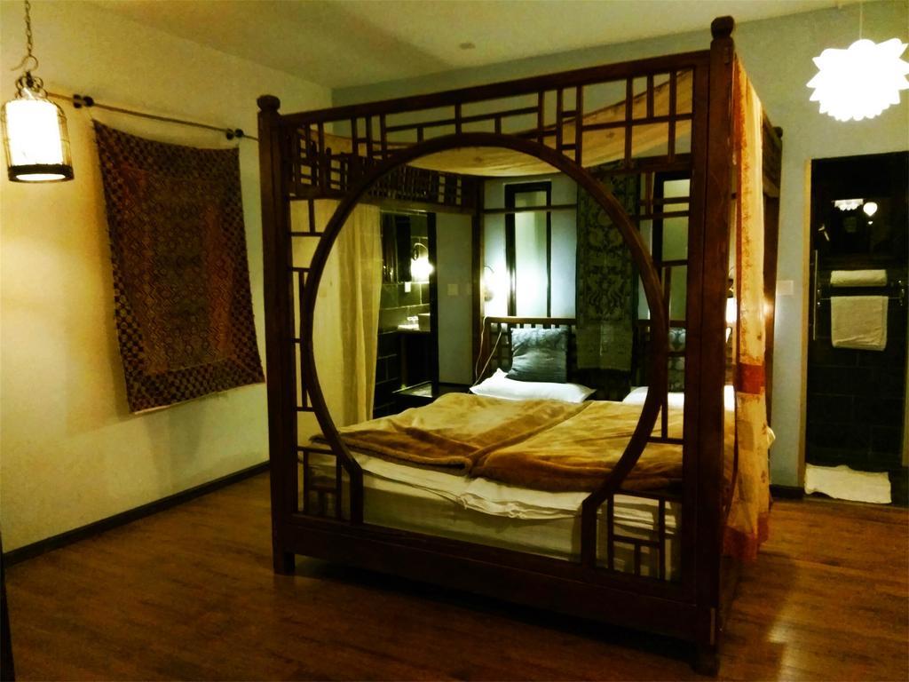 Lijiang Baisha Free Time Designed Hotel Exterior photo