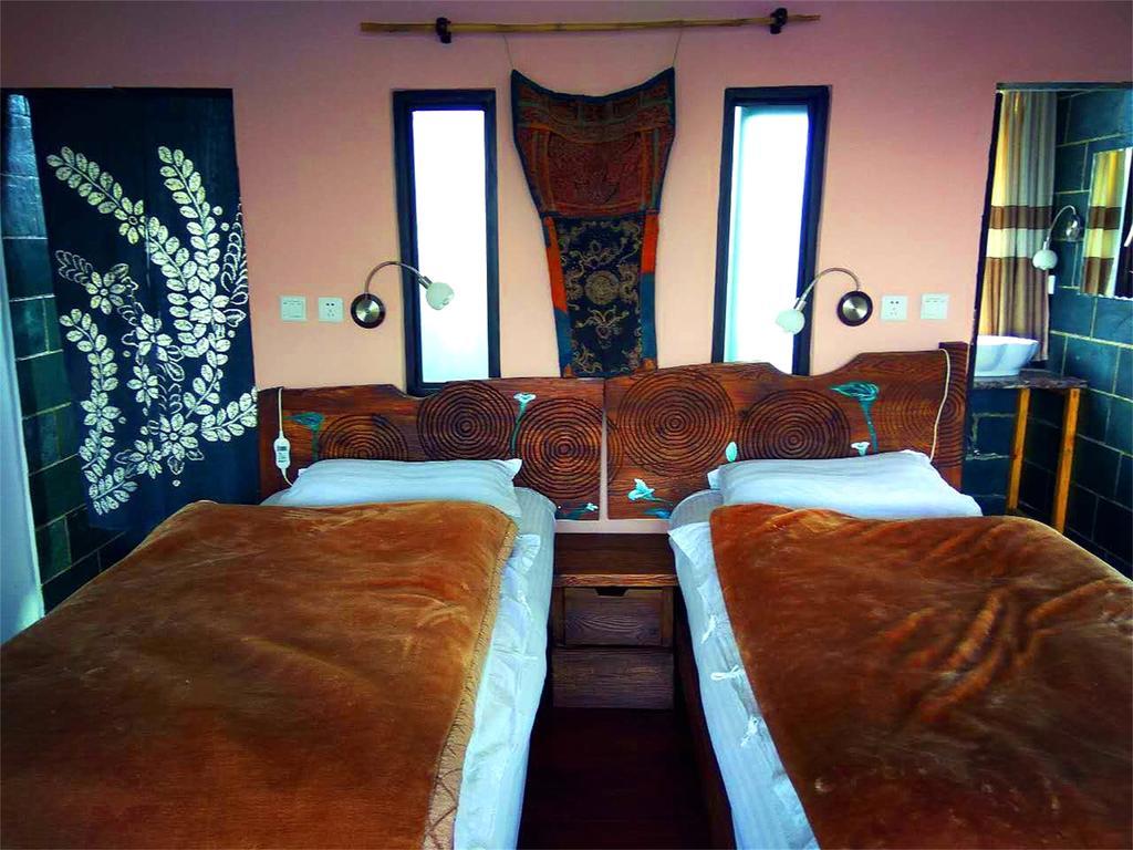 Lijiang Baisha Free Time Designed Hotel Exterior photo
