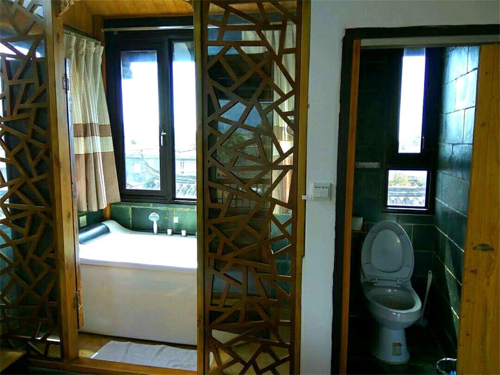 Lijiang Baisha Free Time Designed Hotel Exterior photo