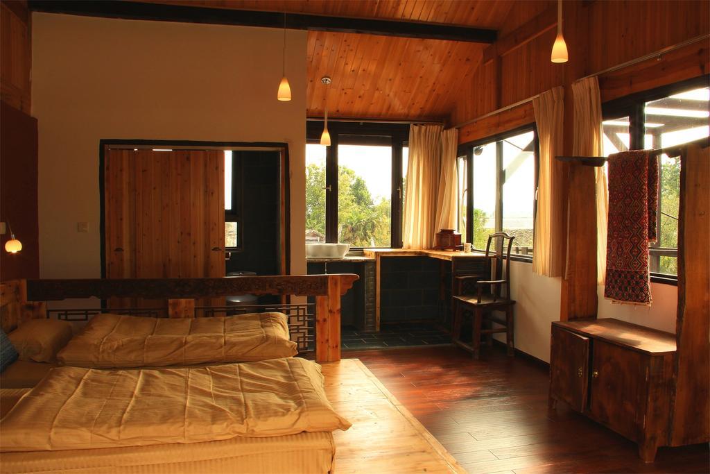 Lijiang Baisha Free Time Designed Hotel Exterior photo